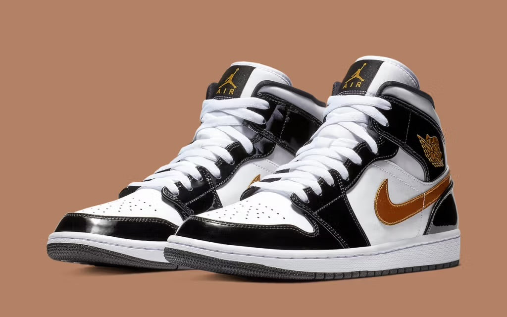 - JORDAN 1 MID - PATENT BLACK WHITE GOLD